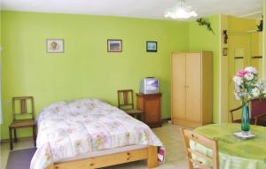 Awesome home in Quettehou with