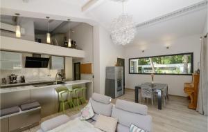 Awesome home in Rognes with Outdoor swimming pool, WiFi and 3 Bedrooms