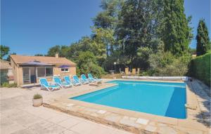 Awesome home in St-Laurent-la-Vernde with 4 Bedrooms, Outdoor swimming pool and Heated swimming pool