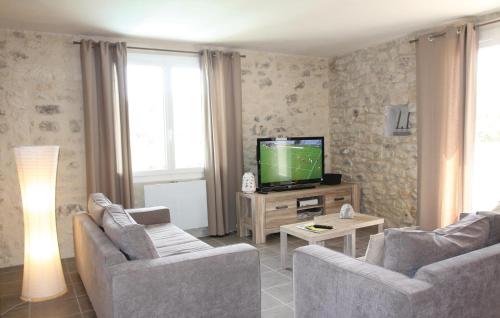 Awesome home in St Restitut with 2 Bedrooms, Private swimming pool and Outdoor swimming pool