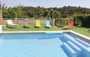 Awesome home in St Restitut with 2 Bedrooms, Private swimming pool and Outdoor swimming pool