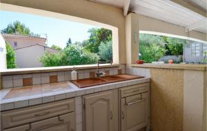 Awesome home in St-Saturnin-les-Avigno with WiFi and Outdoor swimming pool