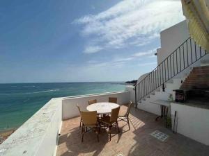 Beautiful 3 floors front beach house with terrace