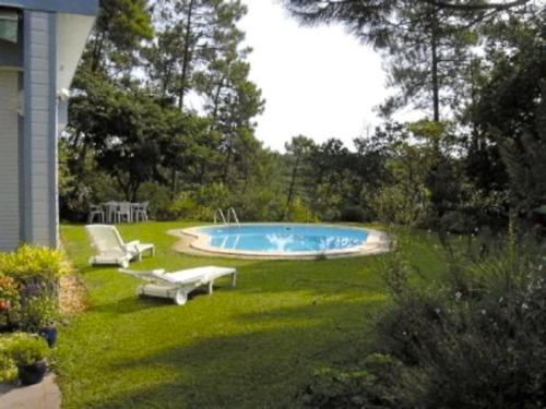 Beautiful flowery garden, pool and pleasant house