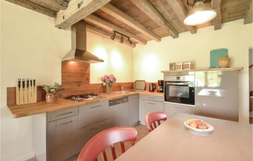 Beautiful home in Charritte de Bas with 2 Bedrooms and WiFi