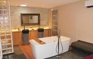 Beautiful home in La Batie Rolland with Jacuzzi, WiFi and Outdoor swimming pool