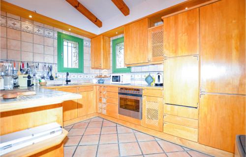 Beautiful home in Lumio with Outdoor swimming pool, WiFi and Private swimming pool