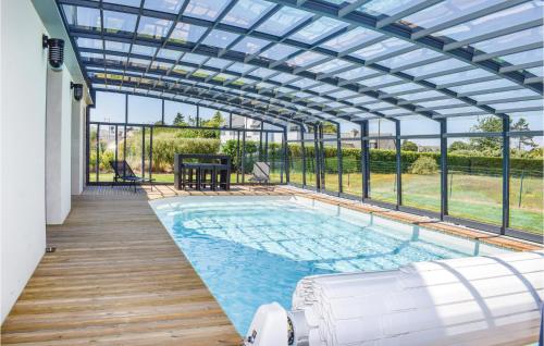 Beautiful home in Plouzec with 4 Bedrooms, WiFi and Heated swimming pool