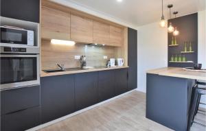 Beautiful home in Saint-Germain-sur-Ay with WiFi and 2 Bedrooms