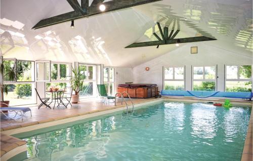 Beautiful home in Yvias with Sauna, WiFi and Indoor swimming pool