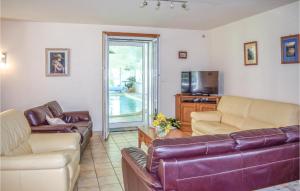 Beautiful home in Yvias with Sauna, WiFi and Indoor swimming pool