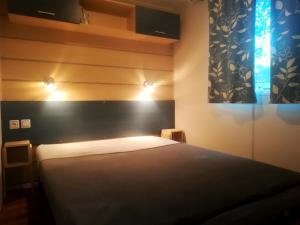 Bungalow de 2 chambres avec piscine partagee jardin amenage et wifi a Aureilhan a 8 km de la plage