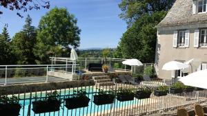 Maison de vacances Bungalow de 3 chambres avec piscine partagee terrasse amenagee et wifi a Argences en Aubrac 1 hameau de banes 12420 Banes Midi-Pyrénées