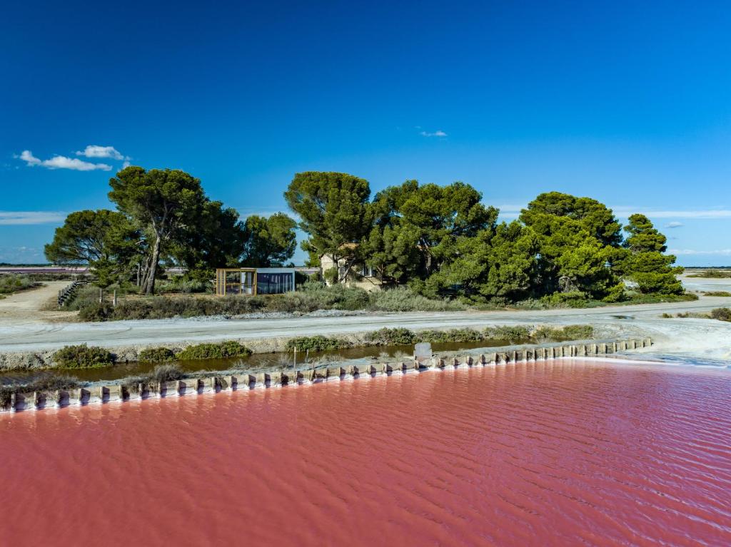 Maison de vacances CABANE DU SAUNIER AU COMMUN - ELECTRE Les salins du Midi, Route du Grau du Roi 30220 Aigues-Mortes