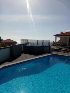 Maison de vacances casa agapanthe piscine et vue mer rua dotor germano goncalves no14 9370-242 Estreito da Calheta Madère