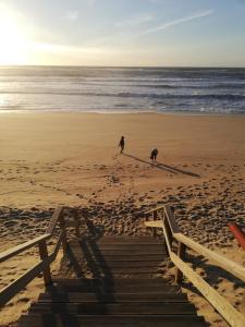Casa com acesso direto à praia e churrasqueira