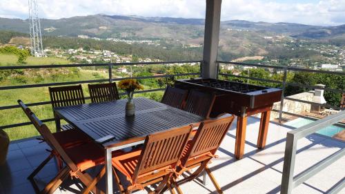Casa de campo com vista a montanha