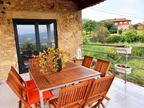 Casa de campo com vista a montanha
