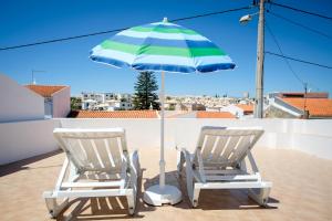 Maison de vacances Casinha da Avó Rua das Palmeiras 17 8365-021 Alcantarilha Algarve