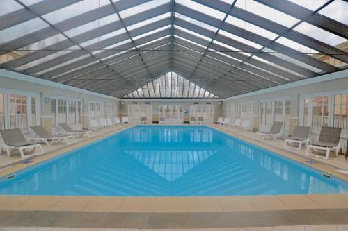 Chaleureux rez de jardin avec piscine au Touquet