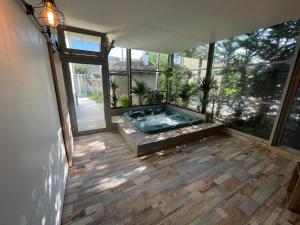 Maison de vacances Charmant logement avec piscine et jacuzzi 9 Rue de la Blind 68320 Riedwihr Alsace