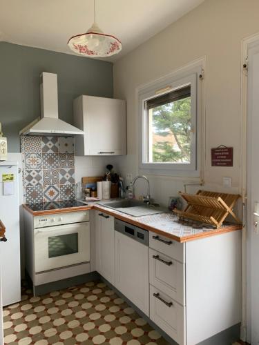 Charmante maison à 30m de la plage, wifi, vélo