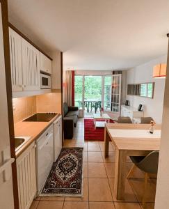 Charmante Maisonette au bord du lac avec piscine