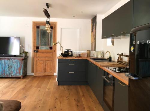 Cottage douillet dans son écrin de verdure