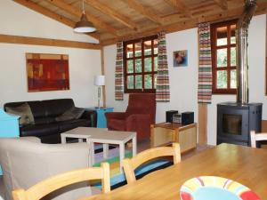 Detached house with a large porch, playground and pool