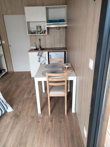 Duplex atypique en bois entre ville et verdures