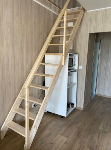 Duplex atypique en bois entre ville et verdures