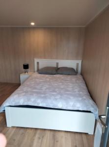 Duplex atypique en bois entre ville et verdures