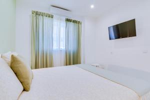 Faro: Casa Trevo com terraço BBQ