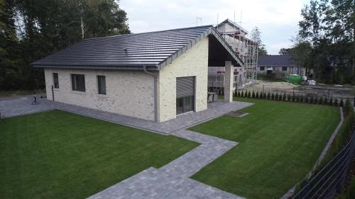 Ferienhaus am Harkebrügger See mit Sauna Haus Leon