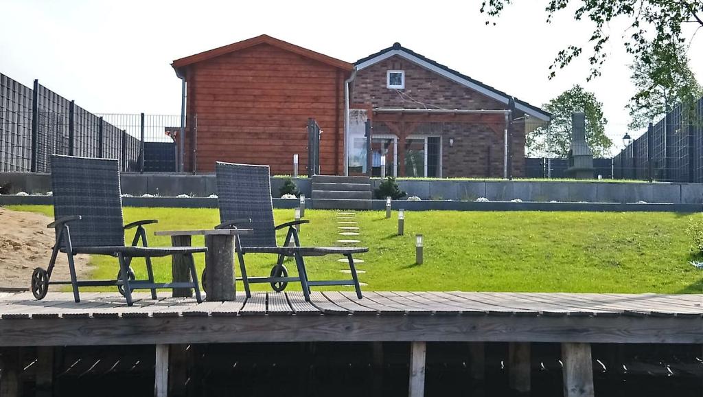 Ferienhaus am See mit Sauna und privatem Seezugang 77 Am Fuhrenkamp, 26676 Barßel