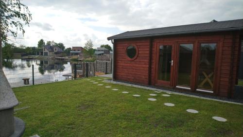 Ferienhaus am See mit Sauna und privatem Seezugang