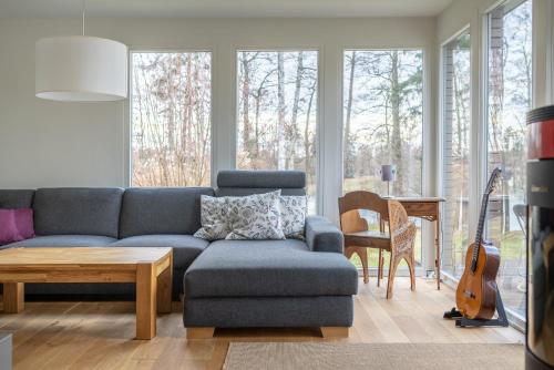 Ferienhaus direkt am See - Kamin, Klima, Sauna und Boot