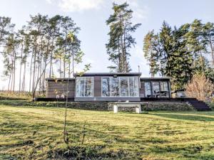 Ferienhaus direkt am See - Kamin, Klima, Sauna und Boot