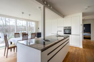 Ferienhaus direkt am See - Kamin, Klima, Sauna und Boot