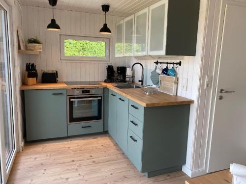 Ferienhaus Heinkens Hoek mit eigenem Bootssteg