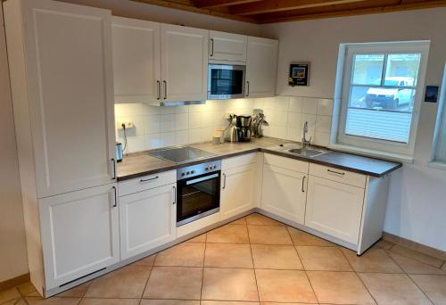 Ferienhaus mit Bootssteg am See in Rheinsberg