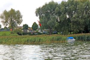 Ferienhaus mit Ruderboot Kummerow SCHW 982
