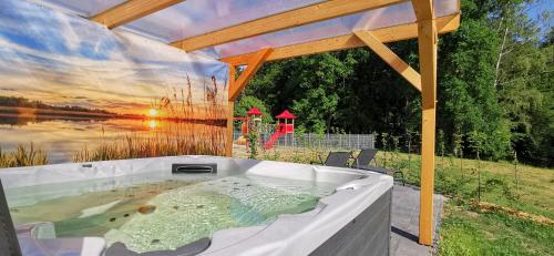 Ferienhaus mit Whirlpool und SUP am Plauer See