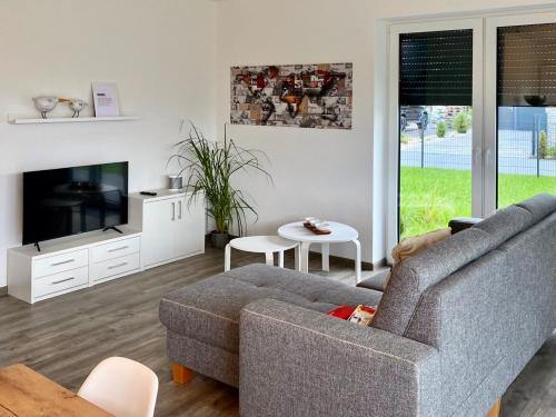 Ferienhaus MOIN. am Harkebrügger See mit Sauna
