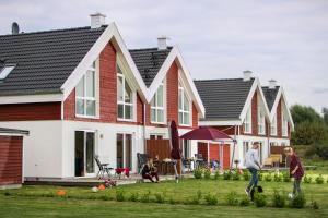 Maison de vacances Ferienhaus Nordhorn - Haus Am See Seepark 57 Navi: Frensdorfer Ring eingeben, Seepark ist von der B 213 aus kommen ausgeschildert 48529 Nordhorn Basse-Saxe