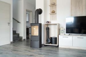 Ferienhaus Seeperle am Harkebrügger See mit Sauna und Kamin