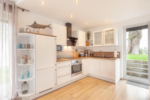 Ferienhaus Sonnendeck 36 - Sauna, Whirlpool, Fahrräder, Wifi