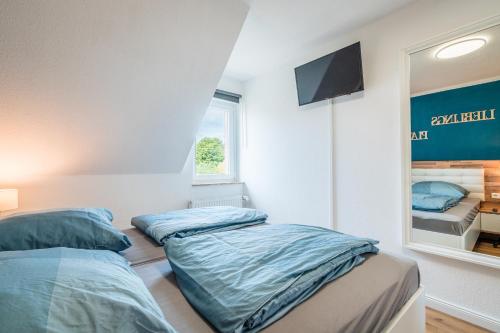 Ferienhaus Steuerbord mit Kamin, Terrasse und Boot