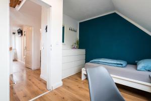 Ferienhaus Steuerbord mit Kamin, Terrasse und Boot