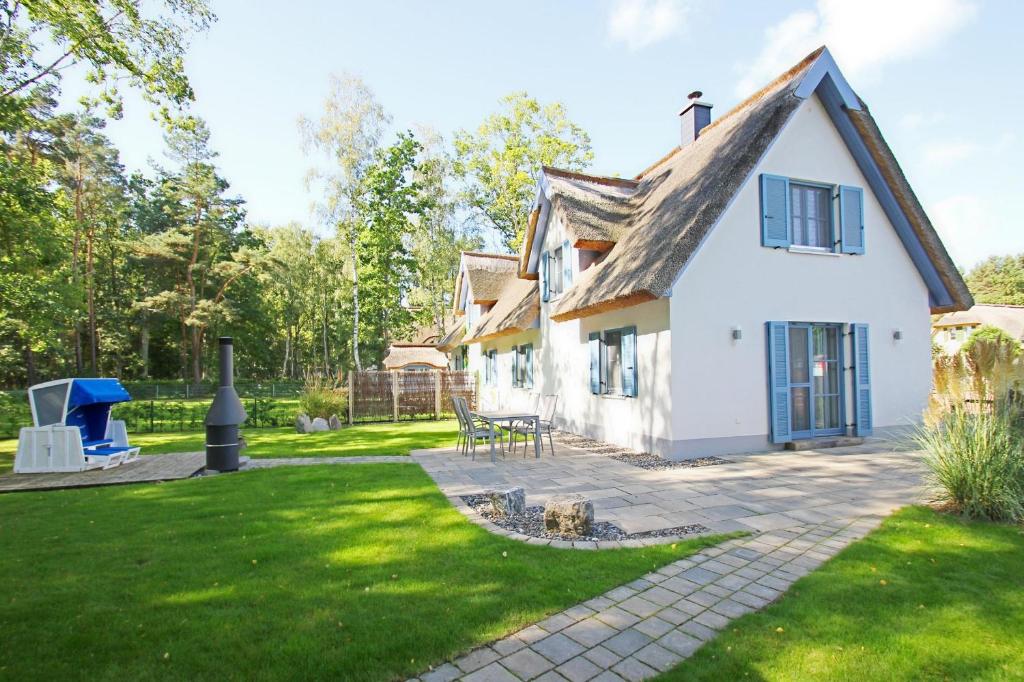 Ferienhaus Stranddistel Haus Terrasse, Garten, eigene Sauna Am Dünenwald 51, 18551 Klein Gelm